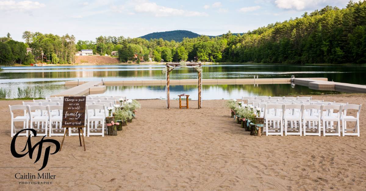beach by lake wedding ceremony setup